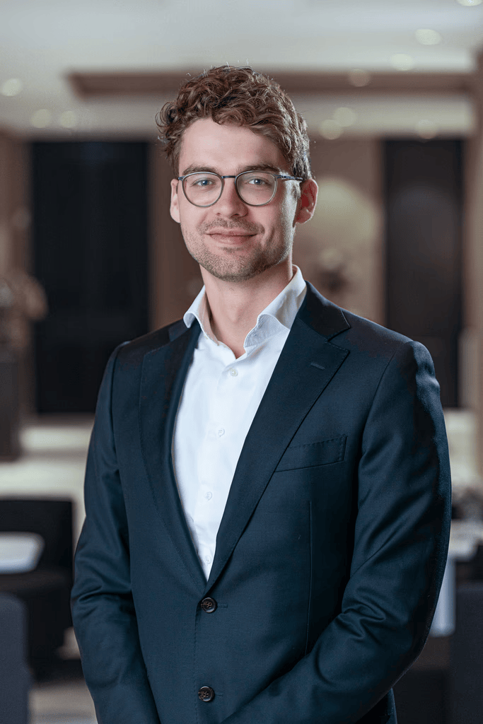 Tom, Precision Health Clinic team member with glasses, professional headshot